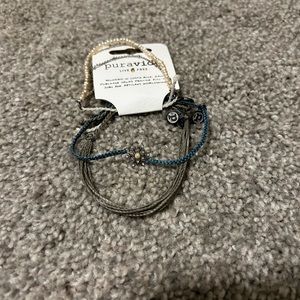 Set of three Puravida bracelets.